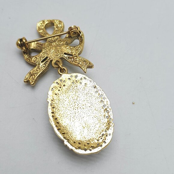 Vintage 1928 Collection Gold Tone Brooch With Green Enamel Cabochon Bow Design - Picture 3 of 4